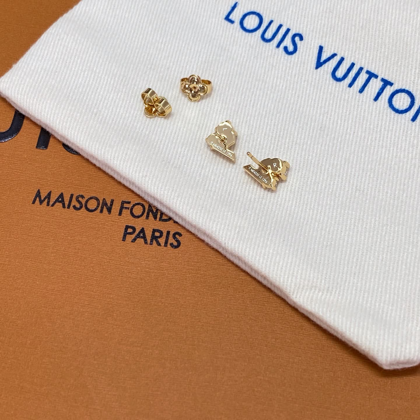 Louis Vuitton Gold Tone Stud Earrings with Clear Stones